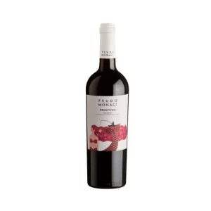 Botella de Primitivo Salento IGT Feudo Monaci – vino tinto italiano sobre fondo blanco